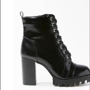 Black heeled lace up boots